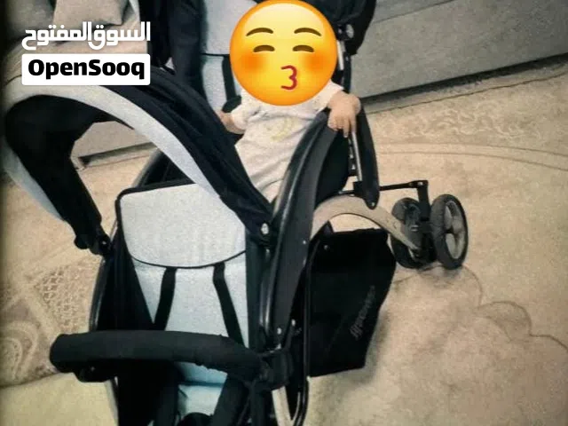 عربة الأطفال توام