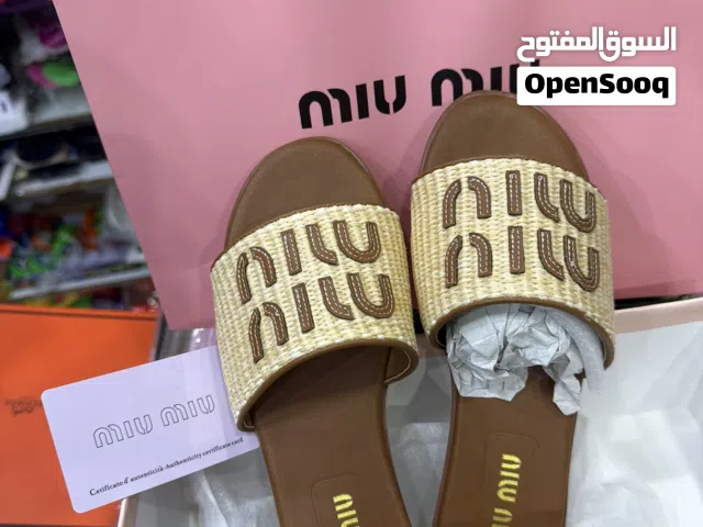 Brown mue mue slipper