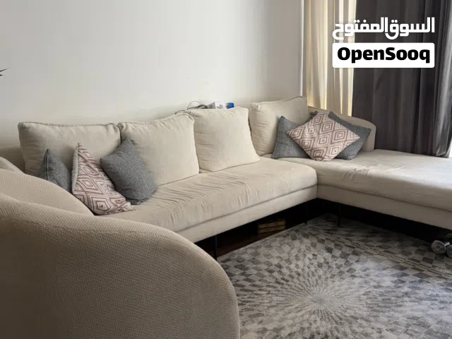 L-Shaped sofa set with 2 chairs - Spacious and Comfortable