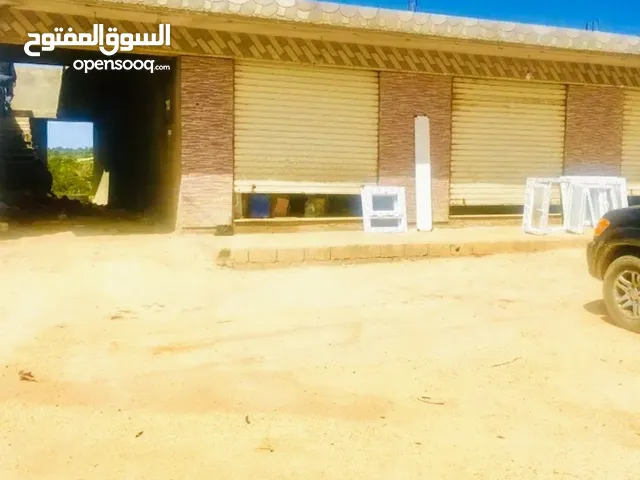 قطعة أرض 500م عالرئيسي طريق شحات سوسه للبيع