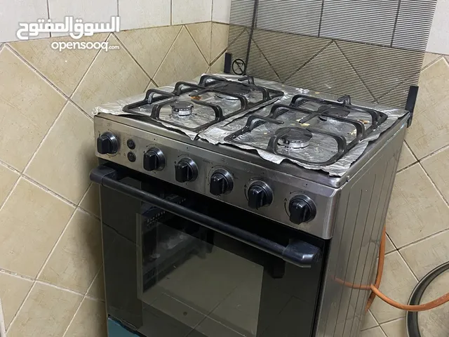 طباخ ميديا ولعة كهربائيه استعمال نظيف ويوجد ضوء داخل الفرن