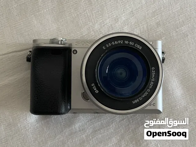 Sony a6000 Mirrorless Camera Kit (Silver) + Dual Charger & Extra Batteries Shutter count 8914.