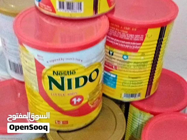 علب حليب فارغة نظيفة