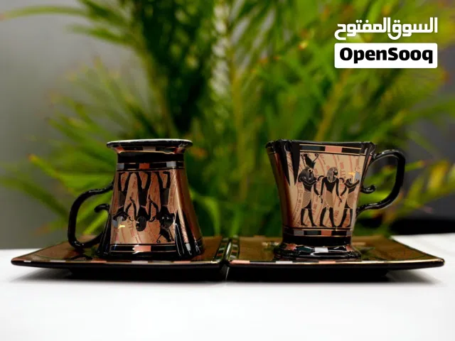طقم مكون من 4 قطع . 2 مج 2 طبق بنقش فرعوني مميز لاصحاب الذوق العالي والانتيكات