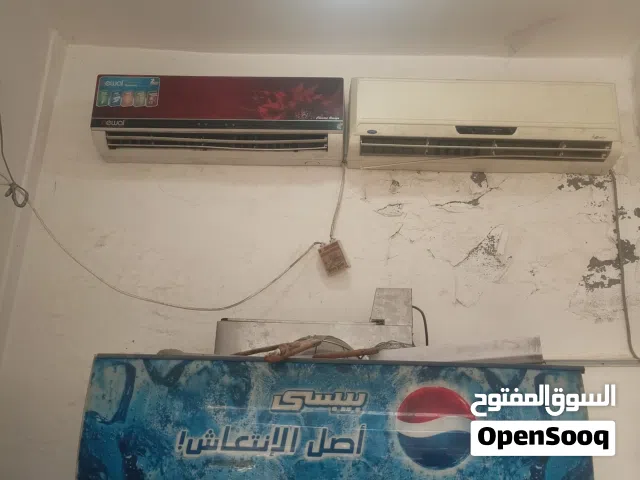 محل للبيع مع اغراضه