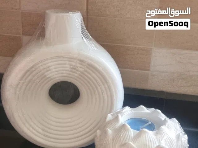 مزهريه مع حامل شموع ب التغليفه جداد