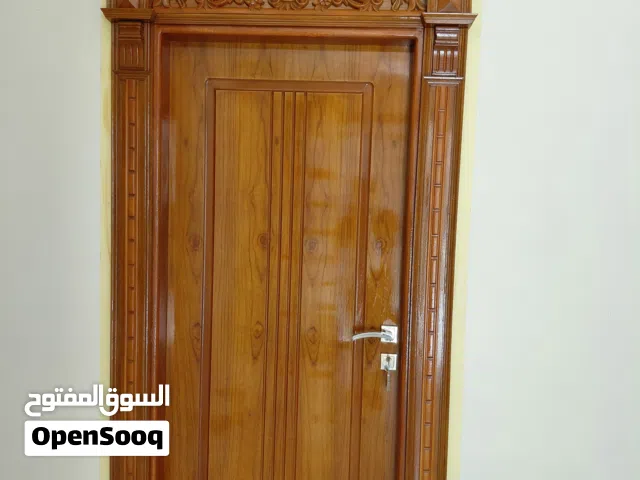 نجارة عباس للابواب والجراجيب عمل درجه اولى