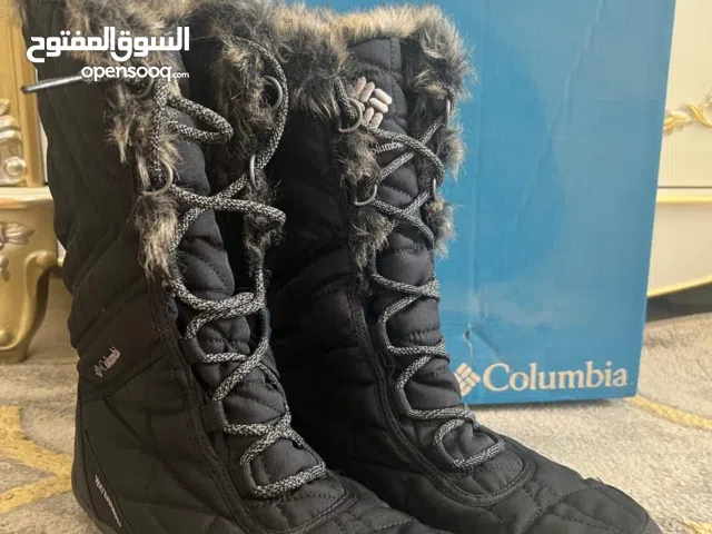 Black Boots in Muscat