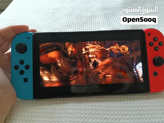 Nintendo switch console with 4 games