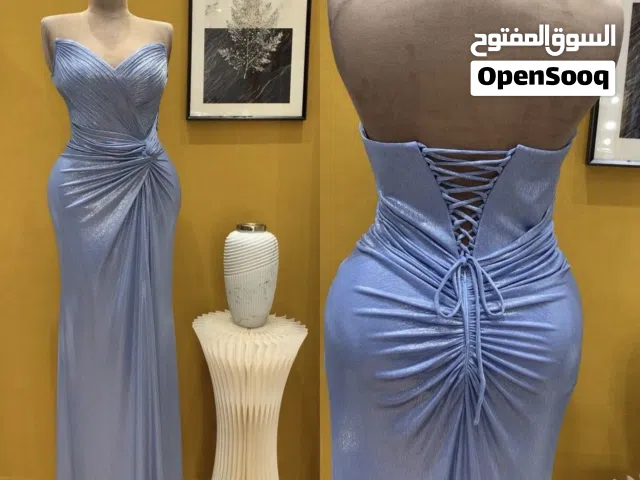فستان ازرق لامع من تصميم إيطالي استعمال مره واحده فقط !