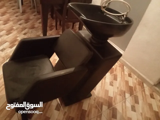 كرسي حلاقه لغسل الشعر