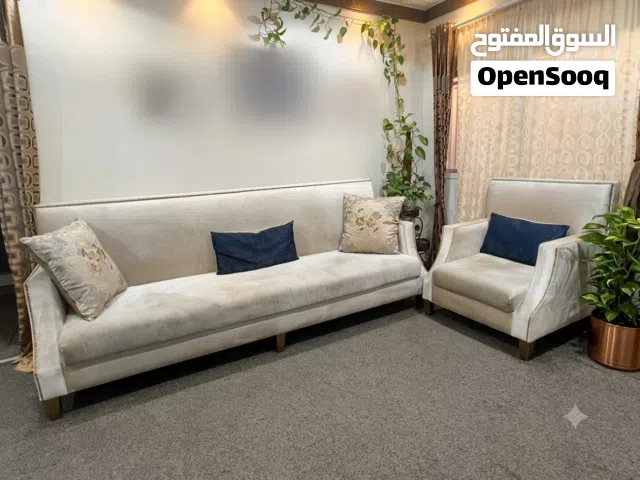 Sofas 4 seater with arm chair with curtain set for sale good condition