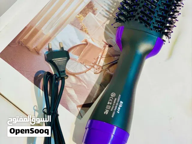 مكواة وشسوار الشعر