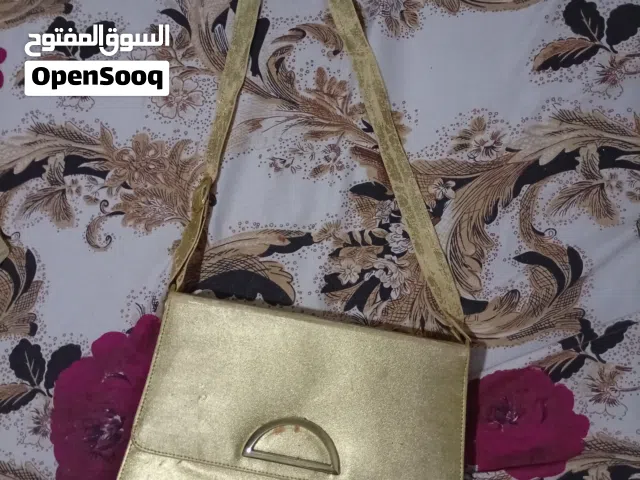 شنطة يد ذهبية ب 50 جنيه