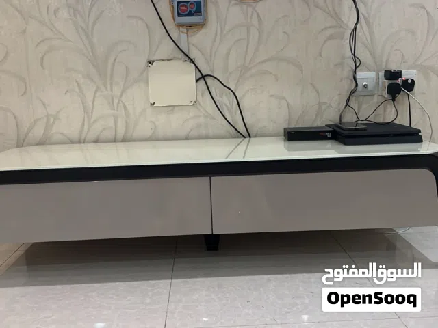طاولة ارضي تحت تلفزيون
