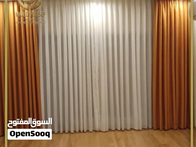 أقمشة و ستائر وبرادي مخمل عرضين  ذات جودة عالية وملمس ناعم  والتفصيل حسب الطلب