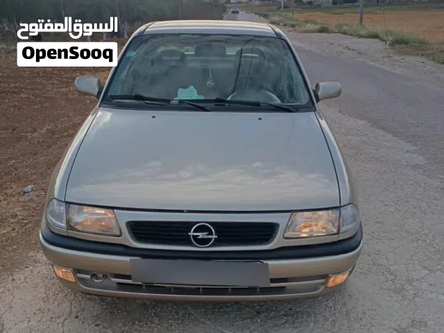 اوبل استرا موديل 1998لون شمباني اتوماتيك ماتور 1600انجكشن فحص مرفق