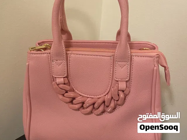 Two handbags pink and purple very nice condition شنطة وردية وشنطة بنفسجي حالة ممتازة