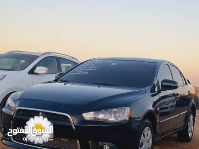 LANCER EX 2015 مكنة كبيرة ممشى 103 الف ترخيص جديد خ 10 لوحة مميزة تكييف ممتاز خالية من الكرك