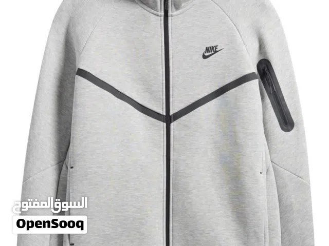 جاكيت نايك رجالي لون رمادي بتصميم رياضي أنيق وعصري مناسب للطلعات اليومية والرياضة والشتاء خفيف مريح