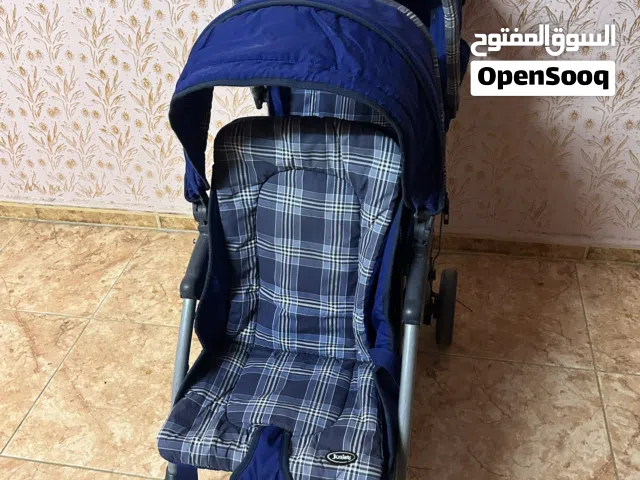 عربة أطفال تؤام