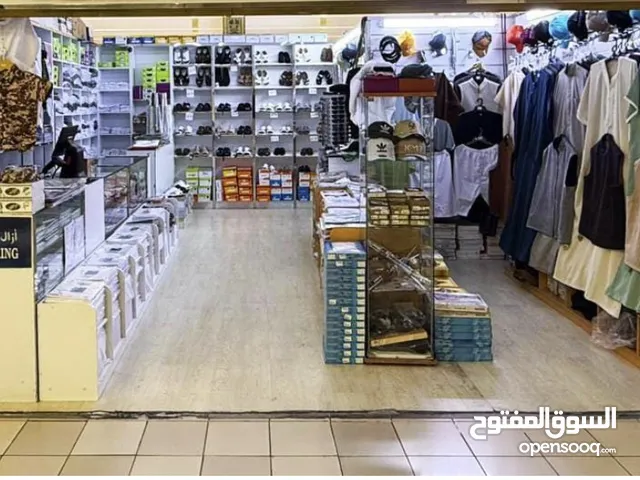 محل ملابس رجاليه وطنيه للبيع