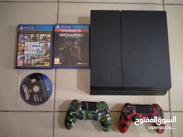 Ps4 with 2 controllers and 4 games