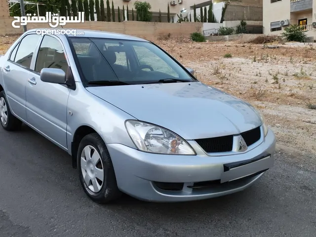 ميتسوبيشي لانسر موديل 2009 فل اتوماتيك فحص كامل 7 جيد