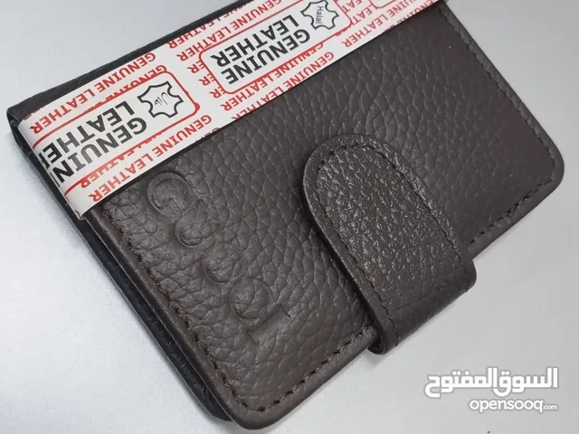 Genuine Leather Snap-Closure Wallet – محفظة جلد طبيعي بقفل كبّاس