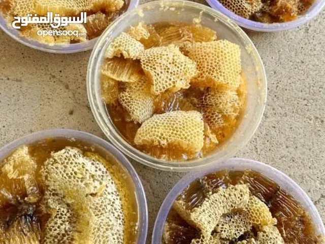 عسل ابوطويق جبلي مال سدر بشمع طبيعي 100٪