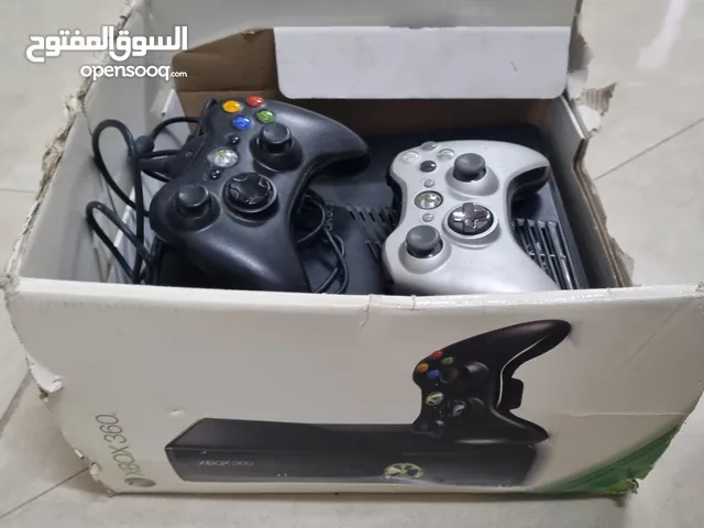 xbox with 2controllers and wheel