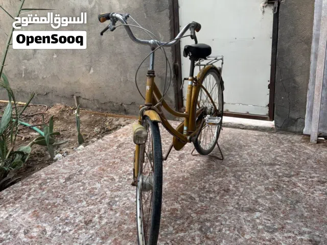 بايسكل سياحي اخو الجديد مستعمل قليل لون اصفر غامق سعرة 135الف وبي مجال