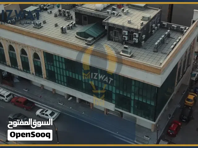 بناية لايجار تحتوي ع محلات تجاريه وشقق سكنية