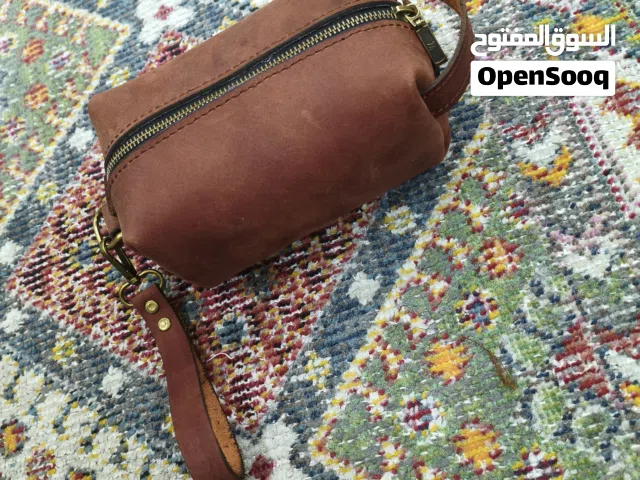 شنطة يد رجالي جلد طبيعي