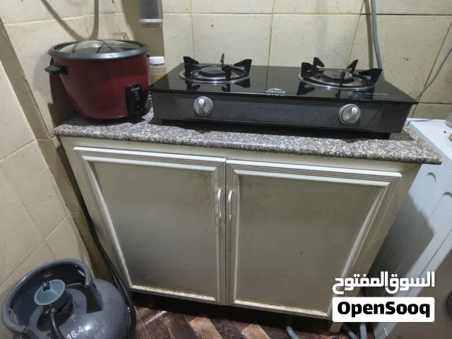 kitchen cabinet with marble, Stove, microwave