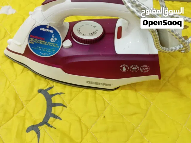 مكواة جيدة وجديدة