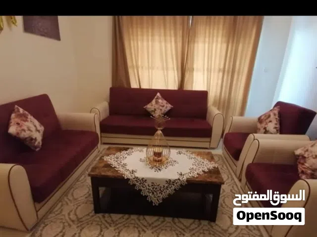 صوفا مع طاولة للبيع