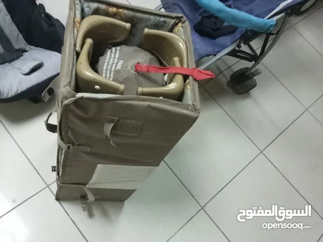 عربات ومقاعد و سراير اطفال بحاله ممتازه للبيع في اربد