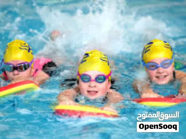 تعليم السباحة   swimming lessons