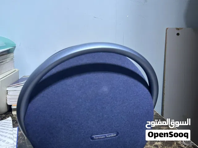 Harman Kardon Onyx Studio 7 Bluetooth portable speaker in blue.