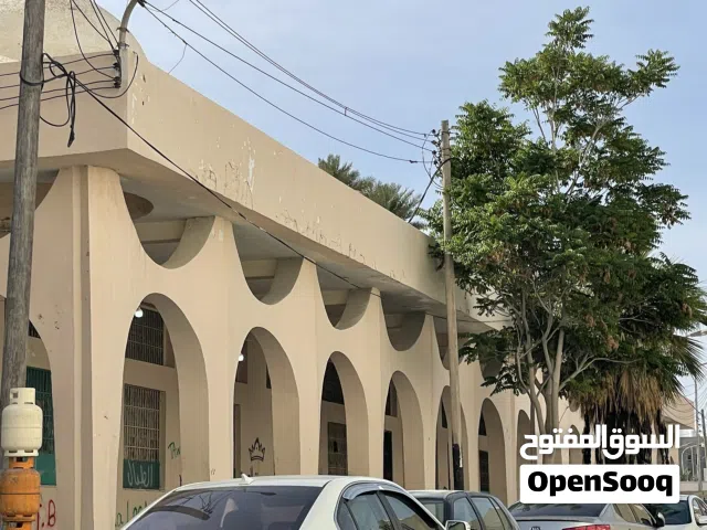 ارض تجارية في سوق الجمعة بجانب HT