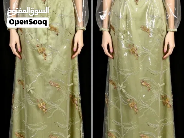 فستان طويل تل مطرز يدوي فخم على الواقع لونه اخضر فاتح الطول 132 الصدر 90 البطن 84سم بالقياس بالصغير