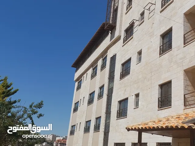 ه للبيع عماره  ضحمه مقابل الجامعه الاردنيه  بناء 2400م مكونه من 7طوابق