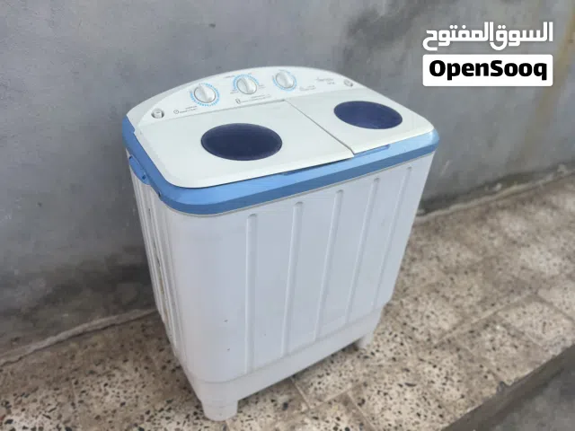 غسالة ملابس عادية