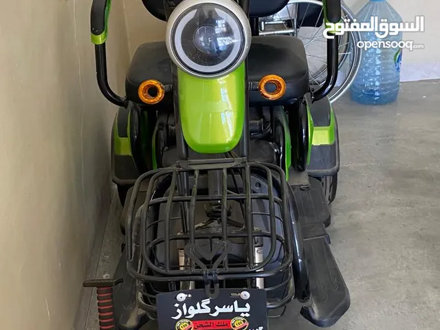 دراجه شحن اربع تاير مستعمل لون اخضر كلشي شغال ونضيف بس يحتاج تبديل بطاريه