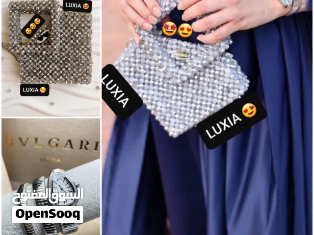 طقم الاناقة الفاخر، ساعة بولغاري فضية وحقيبة كرستال هاند ميد من الكرستال اللامع بشكل ألماسة