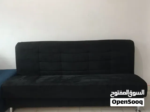 كنبة سرير من هوم سنتر نظيفة بدون عيوب وشبه جديد