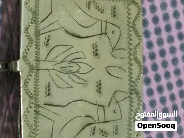 المصحف الشريف القرآن بإطار فضي عمره 100 عاماً