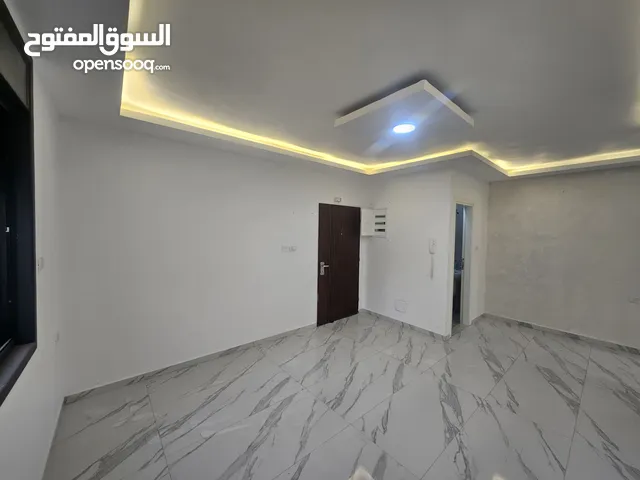 شقة غير مفروش جديدة وسط المدينة