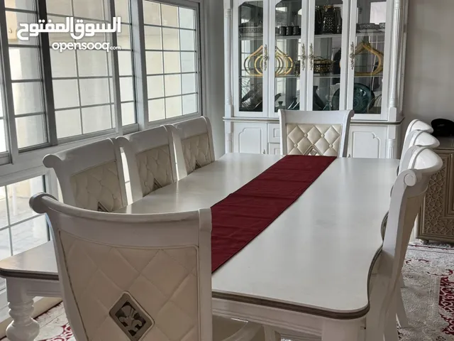طاولة طعام 8 كراسي مع خزانة بوفيه